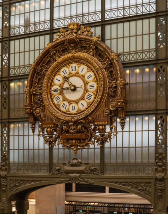The great gilded clock face on the museum's upper level